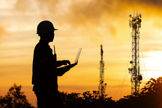 Telecom Engineer Checking Cellular Networks and Signal Towers for 5G and 6G Communications
