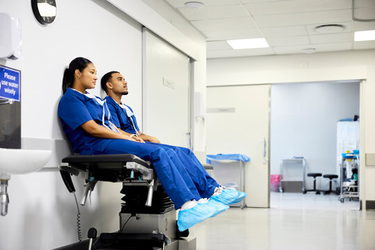 Exhausted Medical staff resting between surgeries