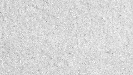 Fototapeta premium Gray textured paper desktop wallpaper with a subtle grainy pattern and speckled details