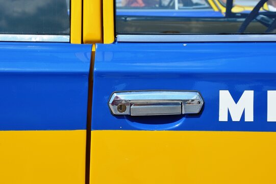 Classic soviet police militsiya sedan car lada vaz 2101 yellow blue with siren