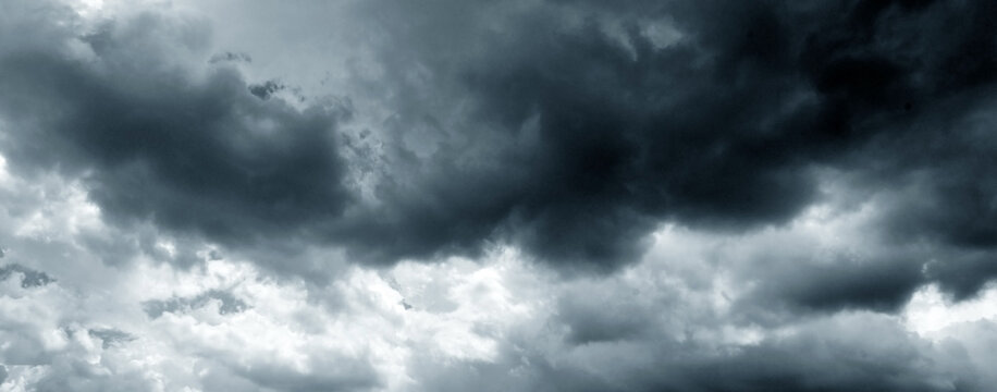 Dramatic storm fluffy cloud sky. Rainy season. Cloudscape background. Pollution, PM 2.5, Carbon dioxide and environment problems concept. Halloween, scary scene thunderstorm and rainy season backdrop.