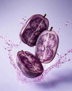 Akebi fruit splash on studio background