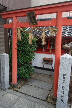 Red Torii Gate at a Small Urban Shinto Shrine in Japan