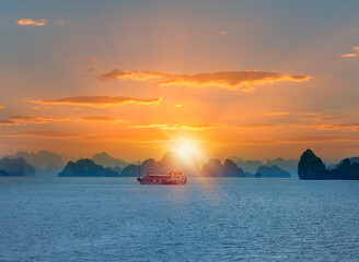 Sunset in the morning on the harbour In Ha long Bay in Vietnam © muratart