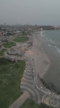 aerial view of charles clore park and alma beach in tel aviv looking towards old jaffa at dusk