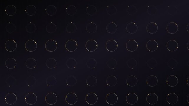 Background of circular patterns on dark surface with subtle glow
