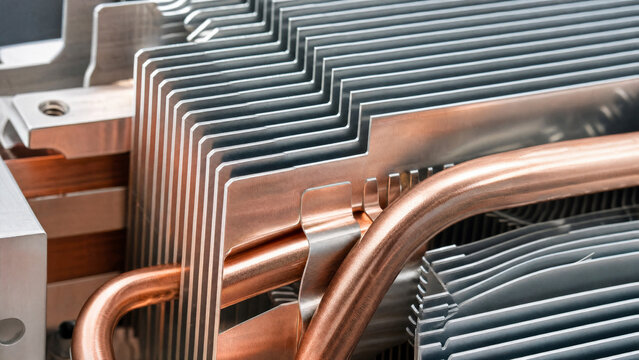 Macro of GPU cooler fin array and copper heat pipes
