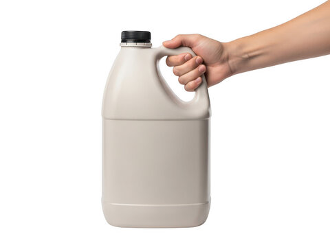 Hand holding white plastic milk jug