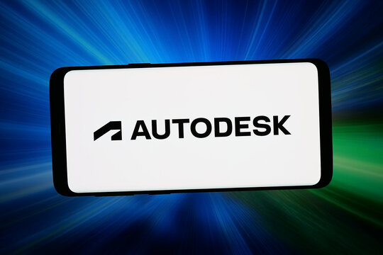 Stuttgart, Germany - 06-10-2026: In this photo illustration, the logo of US software company Autodesk Inc. is displayed on a smartphone in front of abstract background on computer screen.