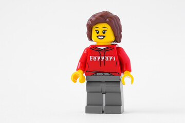 Naklejka premium Kyiv, Ukraine - june 13, 2026: Lego Ferrari woman driver minifigure