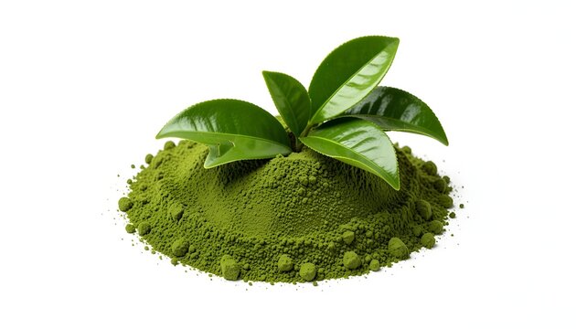 Vibrant green matcha powder with fresh tea leaves on a white background