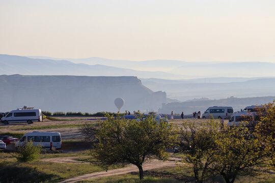 Hot Air Balloon Amidst Cappadocia's Scenic Landscape