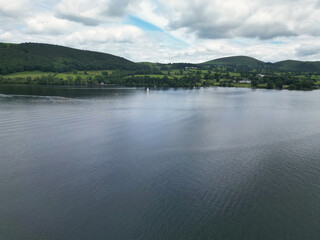 Fototapeta premium Aerial View of Lake Districts Valley and Mountains of UK. Drone Camera View Was Captured From Medium High Altitude During Mostly Dramatic Cloudy Day of Summer 2026