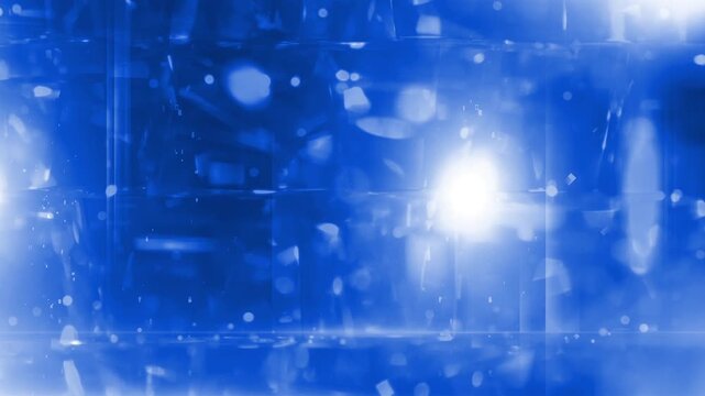 Soft Blue Defocused Bokeh Lights with Light Rays.Abstract soft blue bokeh circles floating with volumetric light Defocused particles background blue video.Celebration abstract blue 