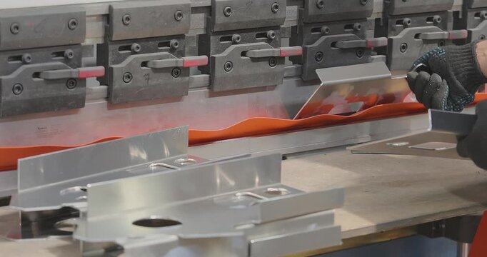 Aluminum Sheet Metal Bending on CNC Press Brake in Modern Boat Manufacturing. Aluminum Sheet Metal Bending on CNC Press Brake in Boat Manufacturing. Metal Sheet Bender. 