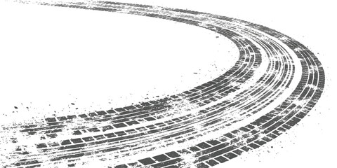Obraz premium Black tire tracks forming a sharp curve on the ground showing high speed driving and dangerous drifting action