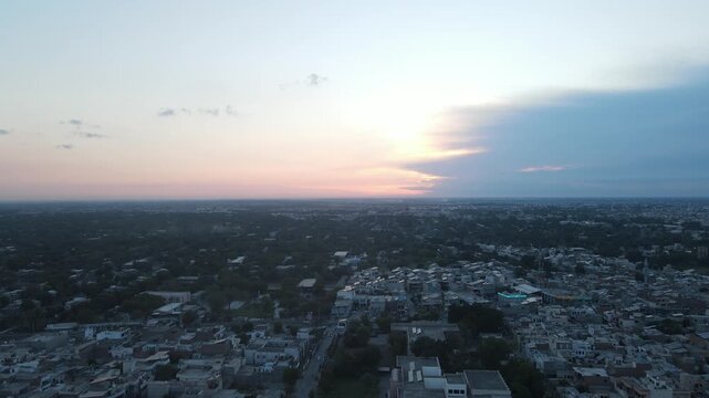 Cinematic Drone Hyperlapse of Bahawalpur City Skyline During Blue Hour, Pakistan Urban Cityscape