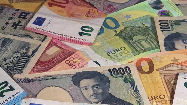 Global foreign exchange market with euro and 1000 yen banknotes