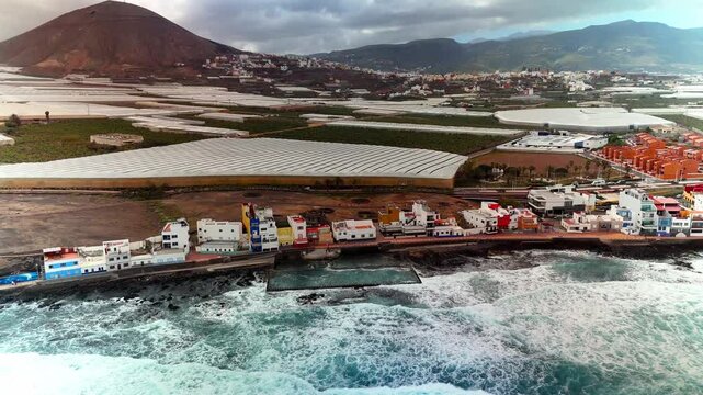 Wide pan of coastline and mountain, El Agujero, Galdar, Gran Canaria
