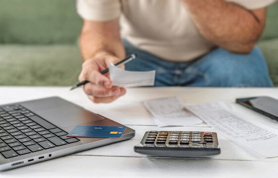 Household Budget Planning With Laptop Card Calculator