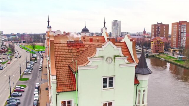 Drone flying over historic German style buildings along the Pregolya river in Kaliningrad