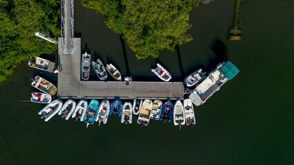 Overhead Drone Shot of Inflatable Boats - Dinghies at  Wooden Pier in the marina © Francisco