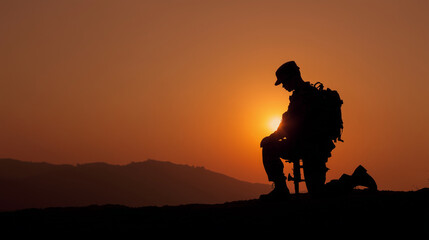 Fototapeta premium Silhouette of soldier kneeling at sunset with backpack on shoulder, emotional military tribute, remembrance, veteran honor, courage, sacrifice, service, freedom, grief, respect and