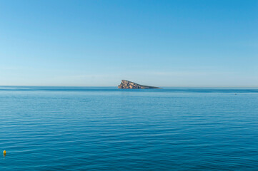Obraz premium Benidorm Island in the calm Mediterranean Sea