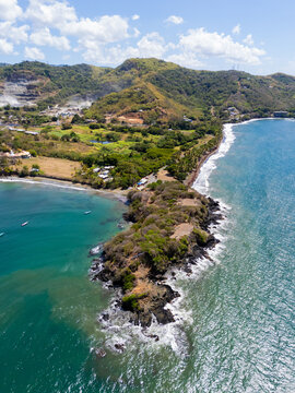 Drone Shot of Rugged Coastline and Green Hills Tobago