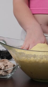 step by step recipe Christmas Easter bread Panettone krafin preparing soft layered Easter cruffin dough dried fruits, orange zest, poppy seeds and butter during homemade sweet bread baking process