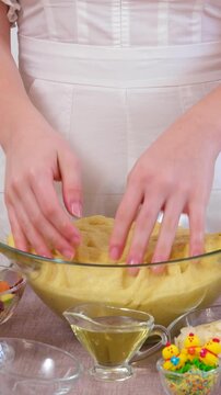step by step recipe Christmas Easter bread Panettone krafin preparing soft layered Easter cruffin dough dried fruits, orange zest, poppy seeds and butter during homemade sweet bread baking process