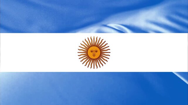 Argentinian flag waving in the wind with the sun of May emblem
