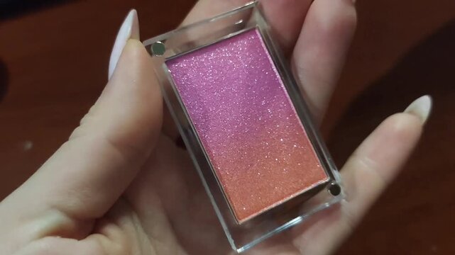Pink Orange Shimmer Makeup Compact in Hand