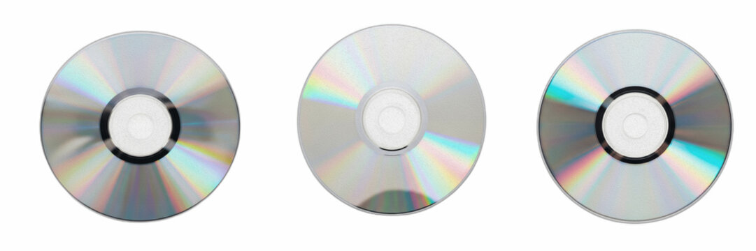 Realistic compact disc CD DVD set isolated on transparent background, shiny blank silver vinyl discs with colorful holographic rainbow reflection mockup for music and data storage, retro digital media