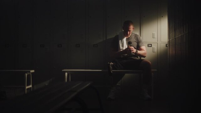 Modern Para Athlete Leans Back in Quiet Recovery After Intense Workout, Resting in Locker Room. Prosthetic Technology, Resilience, Authentic Representation of Disability in Active Lifestyle and Sport.