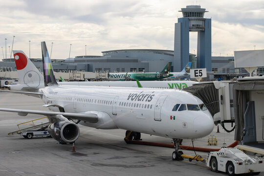 Las Vegas, NV, USA - Oct 27, 2024: An Airbus A321-200 aircraft operated by the Mexican low-cost carrier Volaris is parked at a terminal gate in Harry Reid International Airport in Las Vegas, Nevada.
