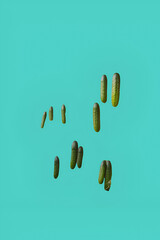 Wooden toothpicks arranged in a curved pattern on turquoise background