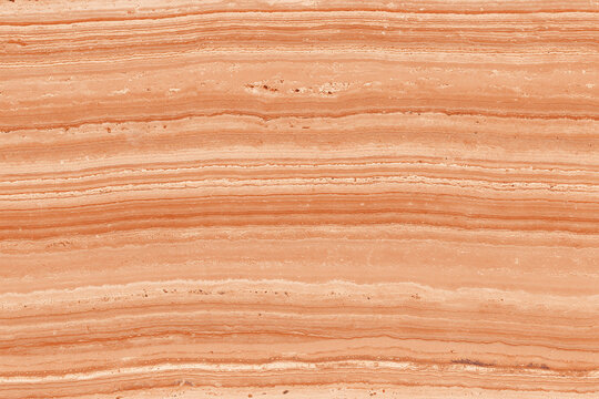 Orange layered marble texture background with horizontal sedimentary bands and natural striations creating warm earthy pattern