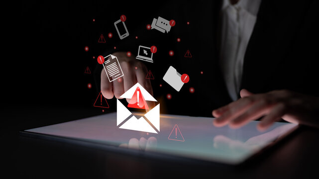A creative representation of digital notifications with alerts symbolizing communication risks, highlighting a tablet and smartphone in a dark workspace setting. Gantry