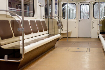 Obraz premium Empty interior of classic subway train car