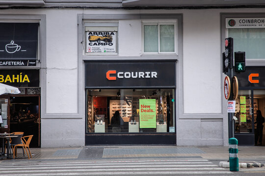 VALENCIA, SPAIN - FEBRUARY 27, 2026: Courir logo displayed on a footwear store facade in Valencia, Spain, Courir is a French chain of fashion retailers specialized in sport shoes and sneakers.
