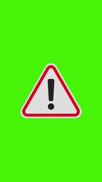 4k Resolution Vertical Video for Social Media: Warning Sign Concept. Red Triangle With Black Exclamation Mark Animated On Green Screen Chroma Key Background With Alpha Matte