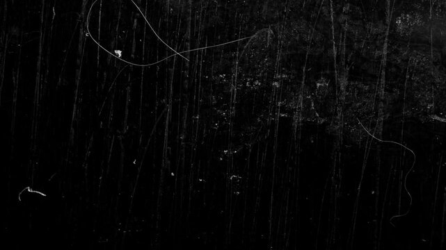 Professional grunge film transition for films, adding gritty motion. dynamic vintage damaged texture 4k background looped smooth animation.
Old film dust analog video overlay for visual effects.