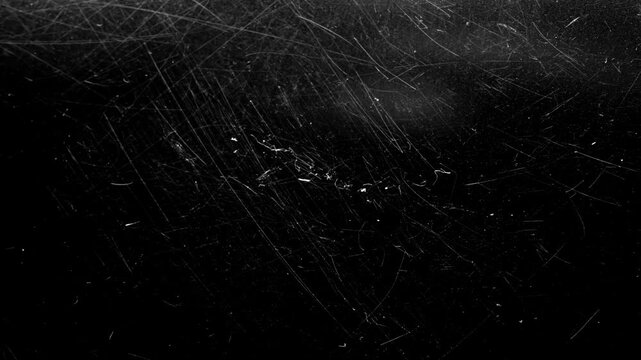 Professional grunge film transition for films, adding gritty motion. dynamic vintage damaged texture 4k background looped smooth animation.
Old film dust analog video overlay for visual effects.