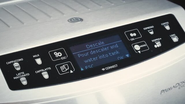 4k Resolution Video: Coffee Machine Maintenance Concept. Finger Confirming Descaling Program On Digital Control Panel Of Stainless Steel Appliance