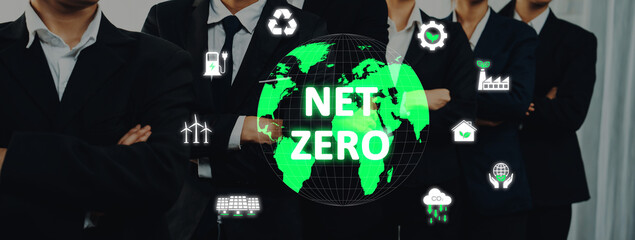 Business team stands confidently with arms crossed, emphasizing commitment to sustainable practices and net zero emissions through innovative solutions for environmental responsibility. Trope © InfiniteFlow