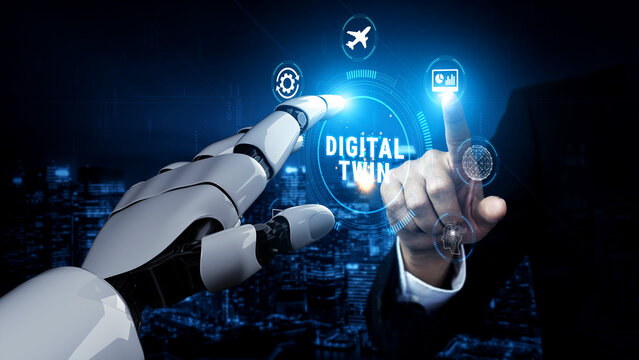 Hand of a humanoid robot and human pointing at a glowing digital twin interface, symbolizing technology and innovation in data analysis and simulation Quark.
