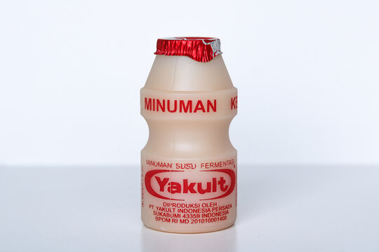 Tangerang, Indonesia - June 12, 2026: Yakult bottle centered on a plain white background.