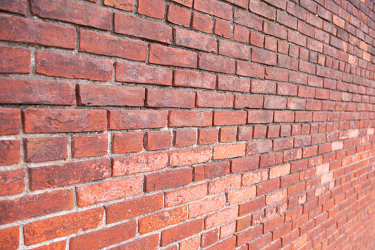 Brick on wall background. Brick in redbrick texture. Brick on masonry surface. Brick rustic backdrop.