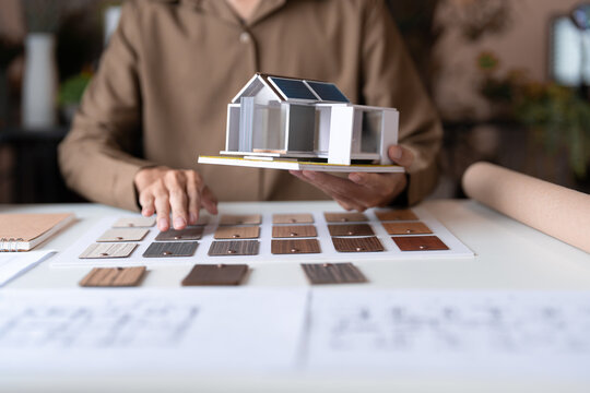 Architecture interior Man Creative project plan designer home and Choose interior materials.